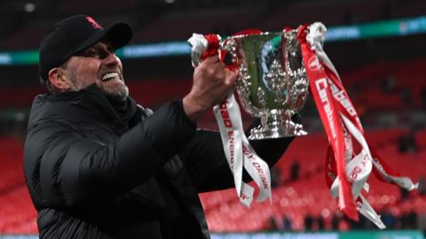 Liverpool boss Jurgen Klopp with EFL Cup trophy