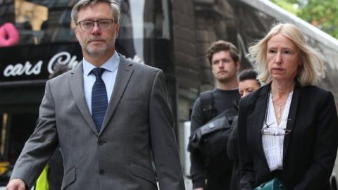 John Letts and Sally Lane arrive at the Old Bailey