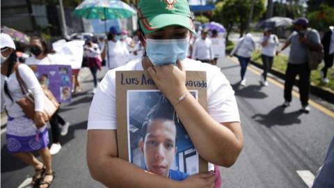 Relatives of people detained during the state of emergency march in San Salvador, El Salvador, 19 July 2022