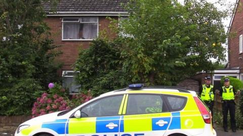 Police at the scene in Greymist Avenue, Woolston, Warrington, Cheshire, following a police counter-terrorism raid where a 31-year-old man was arrested