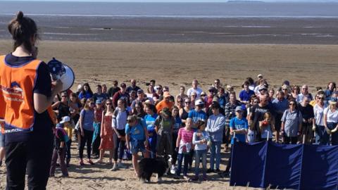 Volunteers on Sand Bay ready for the beach clean