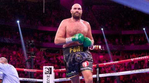 Tyson Fury peels off in celebration