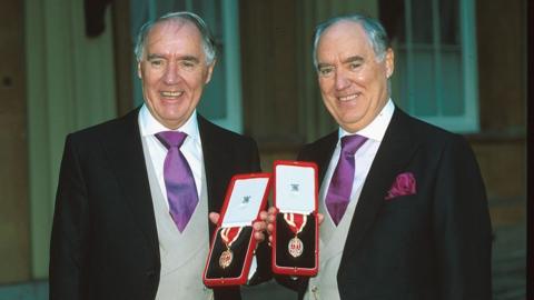 David (right) and Frederick Barclay receiving their knighthoods.