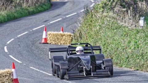 Racing car on the road track