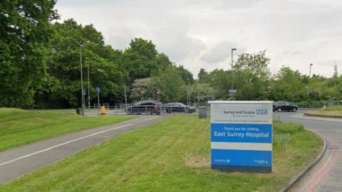 A sign for East Surrey Hospital in Redhill