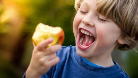 Child with apple