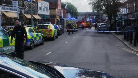 Emergency services pictured on a road in Clarendon Park, Leicester.