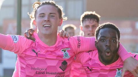 Logan Chalmers (left) celebrates with Austin Samuels of Inverness