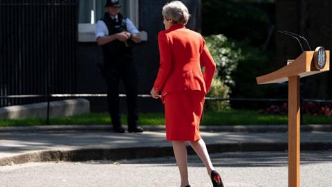 British Prime Minister Theresa May leaves after addressing the media to announce her resignation, outside 10 Downing Street, London, 24 May 2019