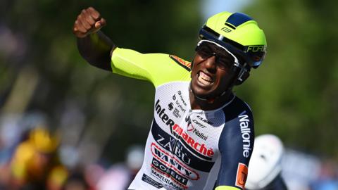 Biniam Girmay (centre) wins a stage of the Giro de Italia