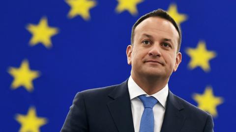 Leo Varadkar in front of an EU flag