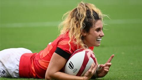 Great Britain's Abbie Brown celebrates a try