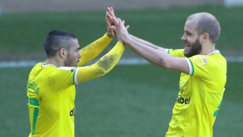 Emi Buendia and Teemu Pukki celebrate