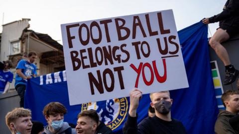 Chelsea fans protest about the European Super League