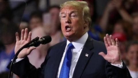 President Donald Trump addresses supporters during a Make America Great Again rally in Southaven, Mississippi, on 2 October