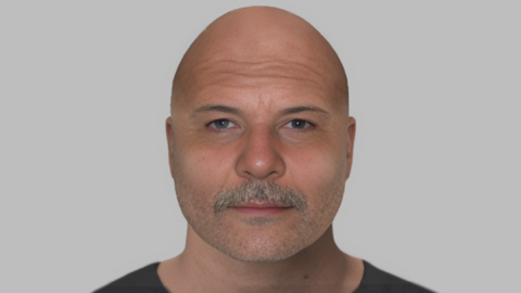 A computer-generated image of the man whose body was found on the beach. He is bald and has a moustache.