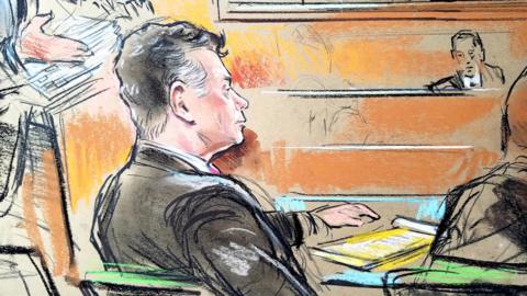 Paul Manafort (front L) in court