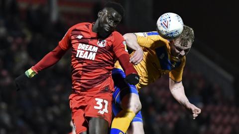 Ousseynou Cisse (left) playing against Mansfield