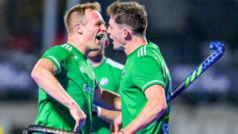 Ben Johnson celebrates with Luke Madeley after scoring in Ireland's win over Ukraine