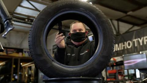 Andrew and a tyre