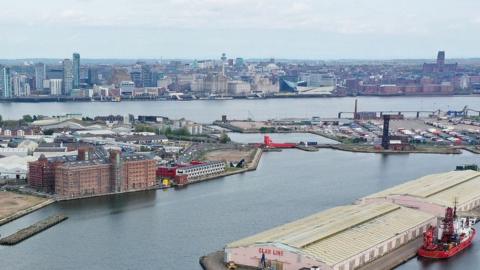 An aerial view shows Birkenhead Docks, including Wirral Waters