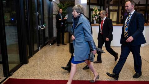 Theresa May leaves the European Council summit after agreeing to extend Brexit until 31 October