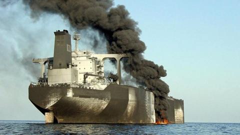 Smoke billows from the French-owned Limburg oil tanker off the coast of the Yemeni port of al-Mukalla, after an explosion that killed one and injured 12 others, 6 October 2002