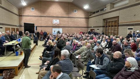 People at the onshore wind farm meeting