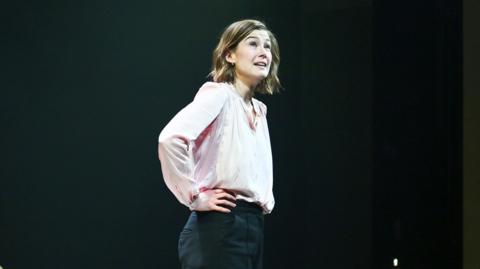 Rosamund Pike bows at the curtain call during the press night performance of Inter Alia at Wyndham's Theatre on April 7, 2026 in London