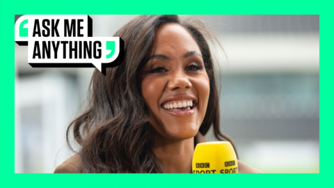 Alex Scott with a BBC Sport microphone