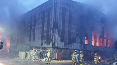 Firefighters at the scene of the fire at a commercial premises in Enniskillen