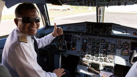 An Indonesian airline pilot