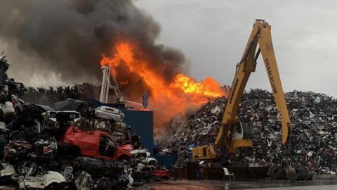 The fire in a pile of scrap metal