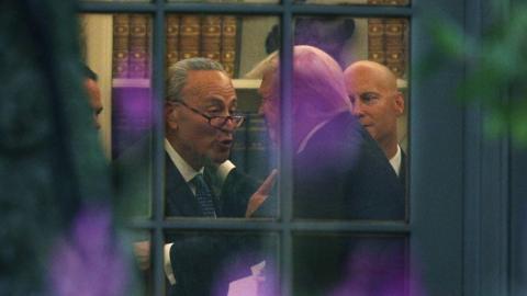 Senate Minority Leader Chuck Schumer and Donald Trump share a moment in the Oval Office.