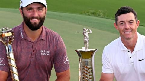 Jon Rahm and Rory McIlroy with trophies