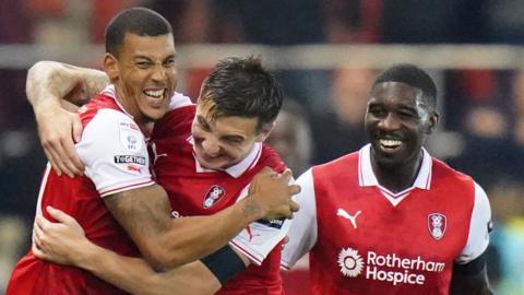 Rotherham players celebrating Lee Peltier's goal