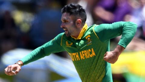 Keshav Maharaj celebrates taking a wicket for South Africa