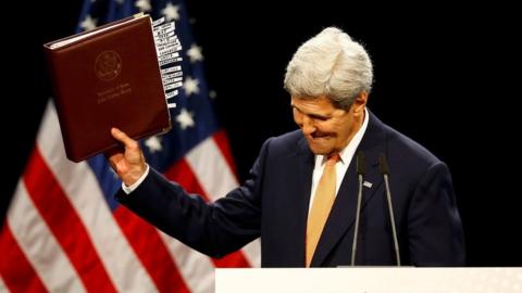 US Secretary of State John Kerry reacts as he delivers a statement on the Iran talks deal at the Vienna International Center in Vienna, Austria July 14, 2015.