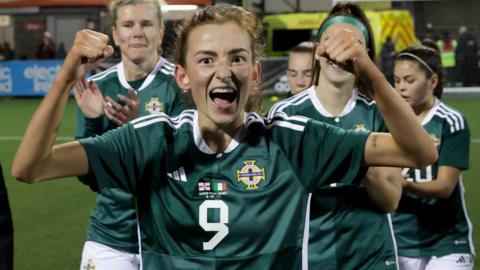 Caitlin McGuinness celebrates