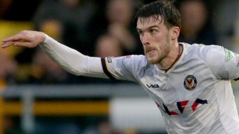 Ryan Delaney in action for Newport County