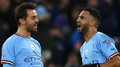 Manchester City's Bernado Silva and Riyad Mahrez