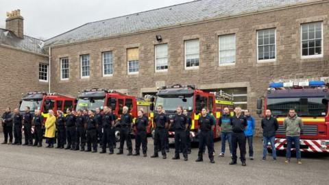 A minute's silence at Jersey Fire and Rescue headquarters