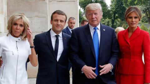 French President Emmanuel Macron (second left) poses next to his wife Brigitte Macron, US President Donald Trump and US First Lady Melania Trump outside the Army Museum during a ceremony at Les Invalides in Paris, France, 13 July 2017