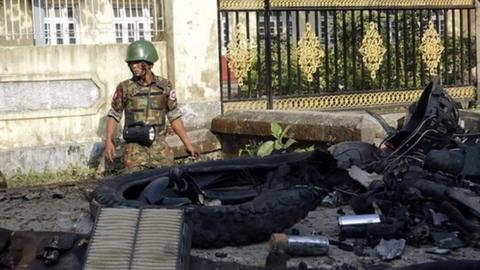 Police inspect bomb wreckage