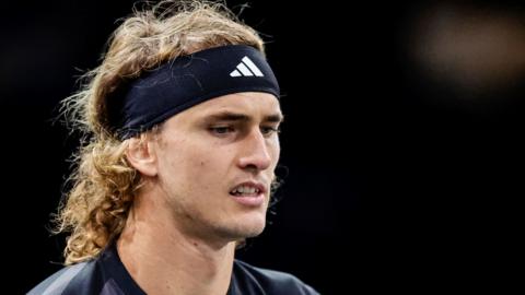 Alexander Zverev between points during a tennis match