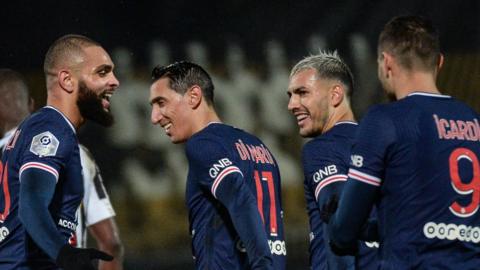 PSG players celebrate scoring against Angers