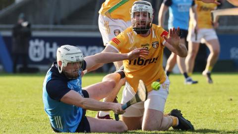 Antrim's Neil McManus battles with Dublin's Conor Donohue during the League contest at Parnell Park in February