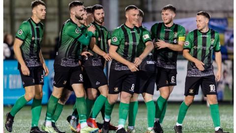 Aberystwyth Town's Harry Arnison celebrates after scoring against Haverfordwest