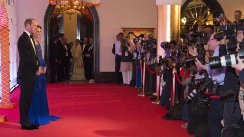 Duke of Duchess of Cambridge pose for photographers as they arrive at charity gala in Mumbai on 10 April 2016