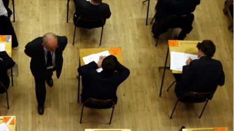 view from above of students taking an exam